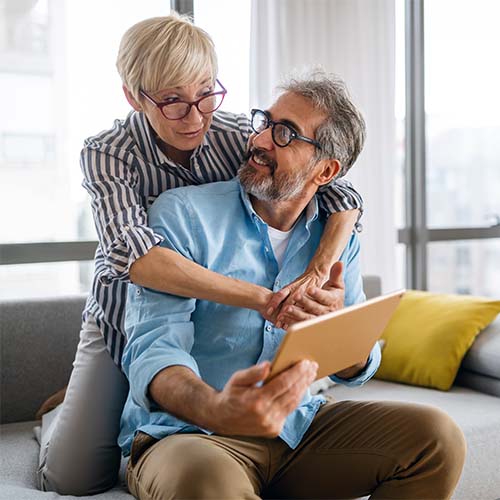 Couple at home on the lounge